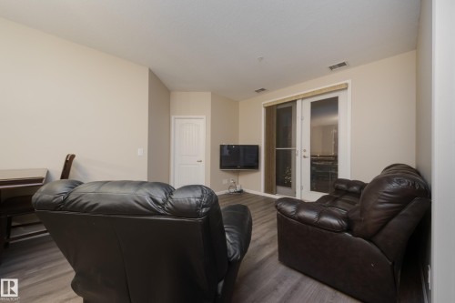 317 6083 Maynard Way, Edmonton, AB - Indoor Photo Showing Living Room