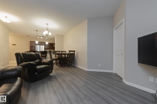 317 6083 Maynard Way, Edmonton, AB - Indoor Photo Showing Living Room