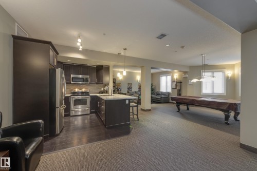 317 6083 Maynard Way, Edmonton, AB - Indoor Photo Showing Kitchen With Upgraded Kitchen