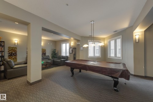 317 6083 Maynard Way, Edmonton, AB - Indoor Photo Showing Other Room