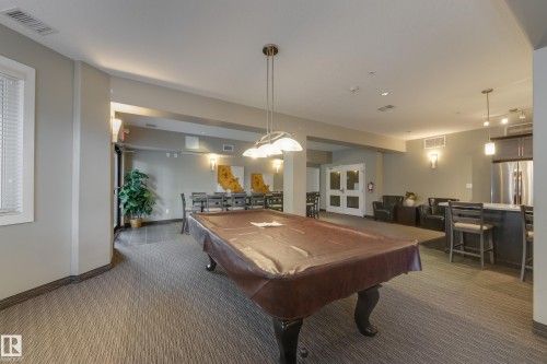317 6083 Maynard Way, Edmonton, AB - Indoor Photo Showing Other Room