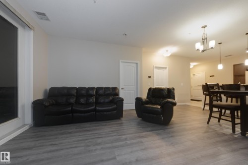 317 6083 Maynard Way, Edmonton, AB - Indoor Photo Showing Living Room