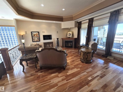 491 52328 Rge Road 233, Rural Strathcona County, AB - Indoor Photo Showing Living Room With Fireplace