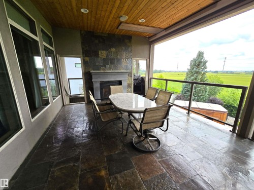 491 52328 Rge Road 233, Rural Strathcona County, AB - Outdoor With Fireplace With Deck Patio Veranda With Exterior