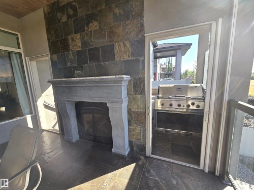 491 52328 Rge Road 233, Rural Strathcona County, AB - Indoor With Fireplace