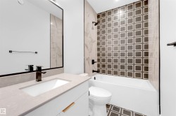 Bathroom with shower / bath combination and vanity - 
