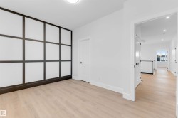 Unfurnished bedroom featuring light wood-style flooring - 