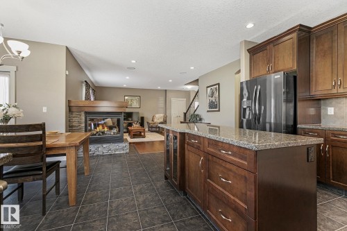 1110 Connelly Court, Edmonton, AB - Indoor Photo Showing Kitchen With Fireplace