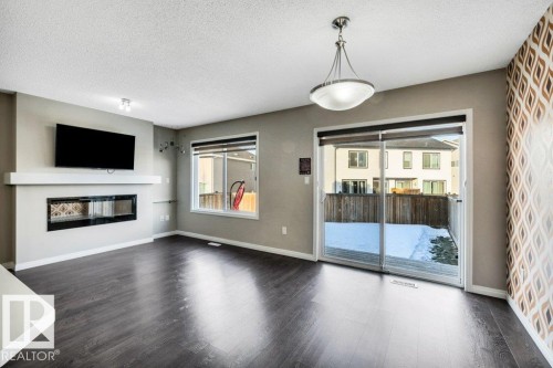 2437 Cassidy Way, Edmonton, AB - Indoor Photo Showing Living Room With Fireplace