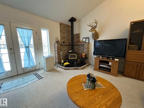 59059 Range 170, Rural Smoky Lake County, AB - Indoor Photo Showing Living Room With Fireplace
