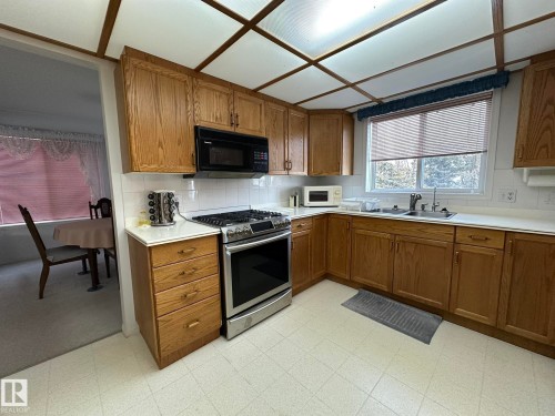 59059 Range 170, Rural Smoky Lake County, AB - Indoor Photo Showing Kitchen With Double Sink