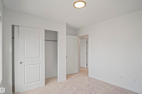 57 19904 31 Avenue, Edmonton, AB - Indoor Photo Showing Other Room