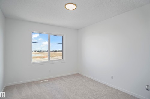 57 19904 31 Avenue, Edmonton, AB - Indoor Photo Showing Other Room