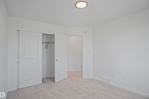 57 19904 31 Avenue, Edmonton, AB - Indoor Photo Showing Other Room