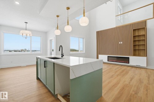 142 Edgewater Circle, Leduc, AB - Indoor Photo Showing Kitchen With Upgraded Kitchen