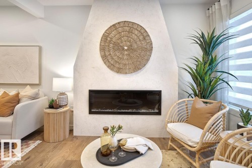 206 Marquis Boulevard, Edmonton, AB - Indoor Photo Showing Other Room With Fireplace