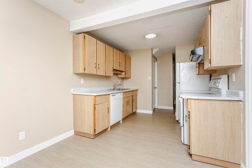 21 11111 26 Avenue, Edmonton, AB - Indoor Photo Showing Kitchen With Double Sink