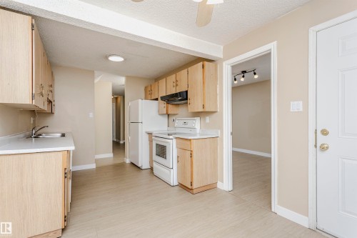 21 11111 26 Avenue, Edmonton, AB - Indoor Photo Showing Kitchen With Double Sink