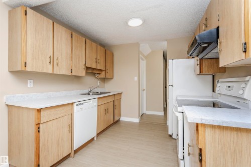 21 11111 26 Avenue, Edmonton, AB - Indoor Photo Showing Kitchen With Double Sink