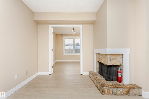 21 11111 26 Avenue, Edmonton, AB - Indoor With Fireplace