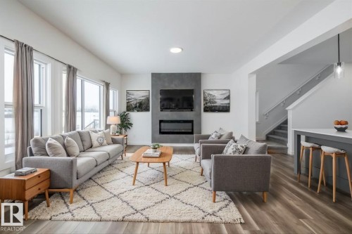 656 Kinglet Boulevard, Edmonton, AB - Indoor Photo Showing Living Room With Fireplace