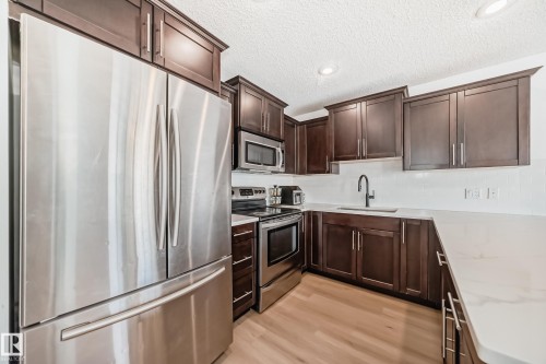 5308 165 Avenue, Edmonton, AB - Indoor Photo Showing Kitchen With Upgraded Kitchen