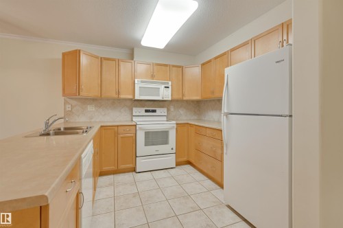 208 8912 156 Street, Edmonton, AB - Indoor Photo Showing Kitchen With Double Sink