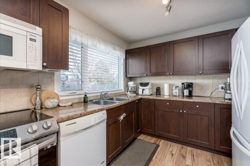 4716 57 Avenue, Tofield, AB - Indoor Photo Showing Kitchen With Double Sink