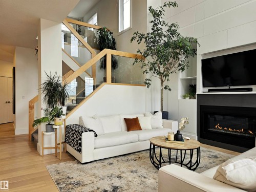 1265 Peregrine Terrace, Edmonton, AB - Indoor Photo Showing Living Room With Fireplace