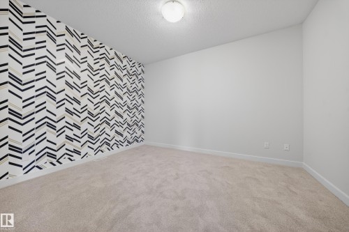 17 1720 Garnett Point(E), Edmonton, AB - Indoor Photo Showing Other Room