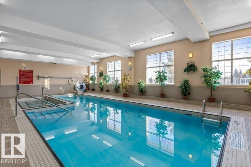 313 11260 153 Avenue, Edmonton, AB - Indoor Photo Showing Other Room With In Ground Pool