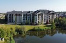 115 105 West Haven Drive, Leduc, AB  - Outdoor With Body Of Water With Facade 