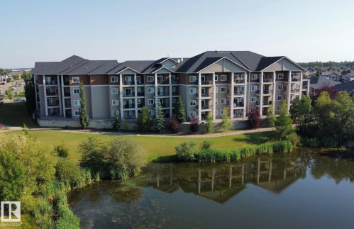 112 105 West Haven Drive, Leduc, AB - Outdoor With Body Of Water With Facade