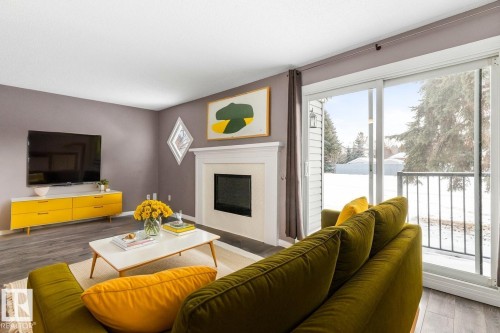 5346 38A Avenue, Edmonton, AB - Indoor Photo Showing Living Room With Fireplace