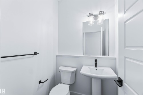 Bathroom featuring toilet - 2211 4 Avenue, Edmonton, AB - Indoor Photo Showing Bathroom