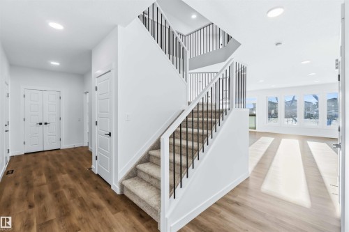 Stairway featuring wood finished floors and recessed lighting - 2211 4 Avenue, Edmonton, AB - Indoor Photo Showing Other Room
