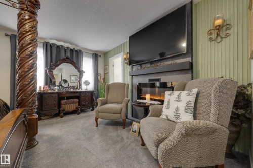 64 Maple Crescent, Gibbons, AB - Indoor With Fireplace