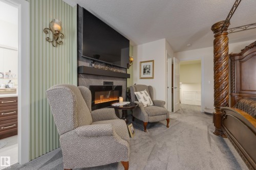 64 Maple Crescent, Gibbons, AB - Indoor With Fireplace
