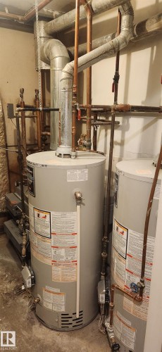 Utilities featuring gas water heater - 9540 - 100 Avenue, Westlock, AB - Indoor Photo Showing Basement