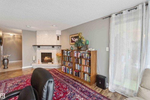 305 8707 107 Street, Edmonton, AB - Indoor With Fireplace