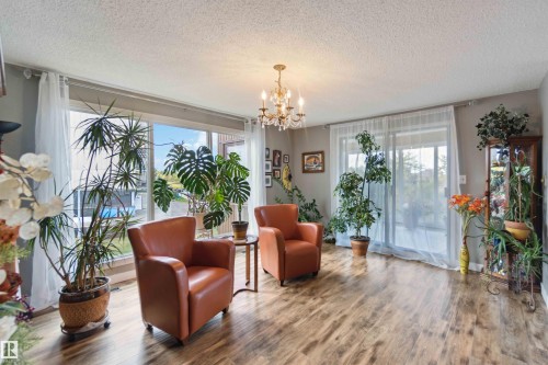305 8707 107 Street, Edmonton, AB - Indoor Photo Showing Living Room