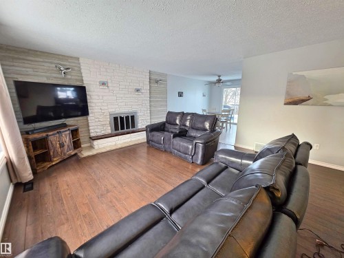 5614 52 Avenue, St. Paul Town, AB - Indoor Photo Showing Living Room With Fireplace