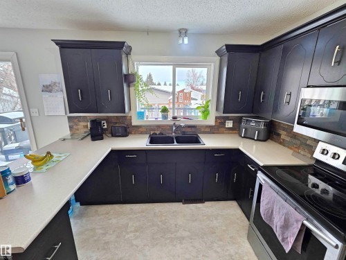 5614 52 Avenue, St. Paul Town, AB - Indoor Photo Showing Kitchen With Double Sink