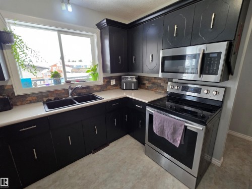 5614 52 Avenue, St. Paul Town, AB - Indoor Photo Showing Kitchen With Double Sink