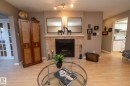 203 10171 119 Street Nw, Edmonton, AB  - Indoor Photo Showing Other Room With Fireplace 