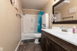 Bathroom with shower / bath combo and vanity - 