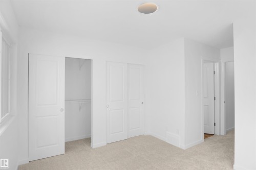 90 1430 Aster Way, Edmonton, AB - Indoor Photo Showing Other Room