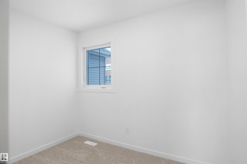 90 1430 Aster Way, Edmonton, AB - Indoor Photo Showing Other Room