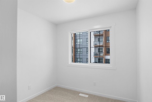 90 1430 Aster Way, Edmonton, AB - Indoor Photo Showing Other Room