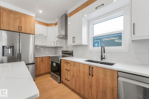 12206 63 Street, Edmonton, AB - Indoor Photo Showing Kitchen With Stainless Steel Kitchen With Double Sink With Upgraded Kitchen